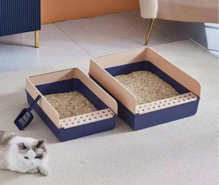 fence cat litter box with a shovel